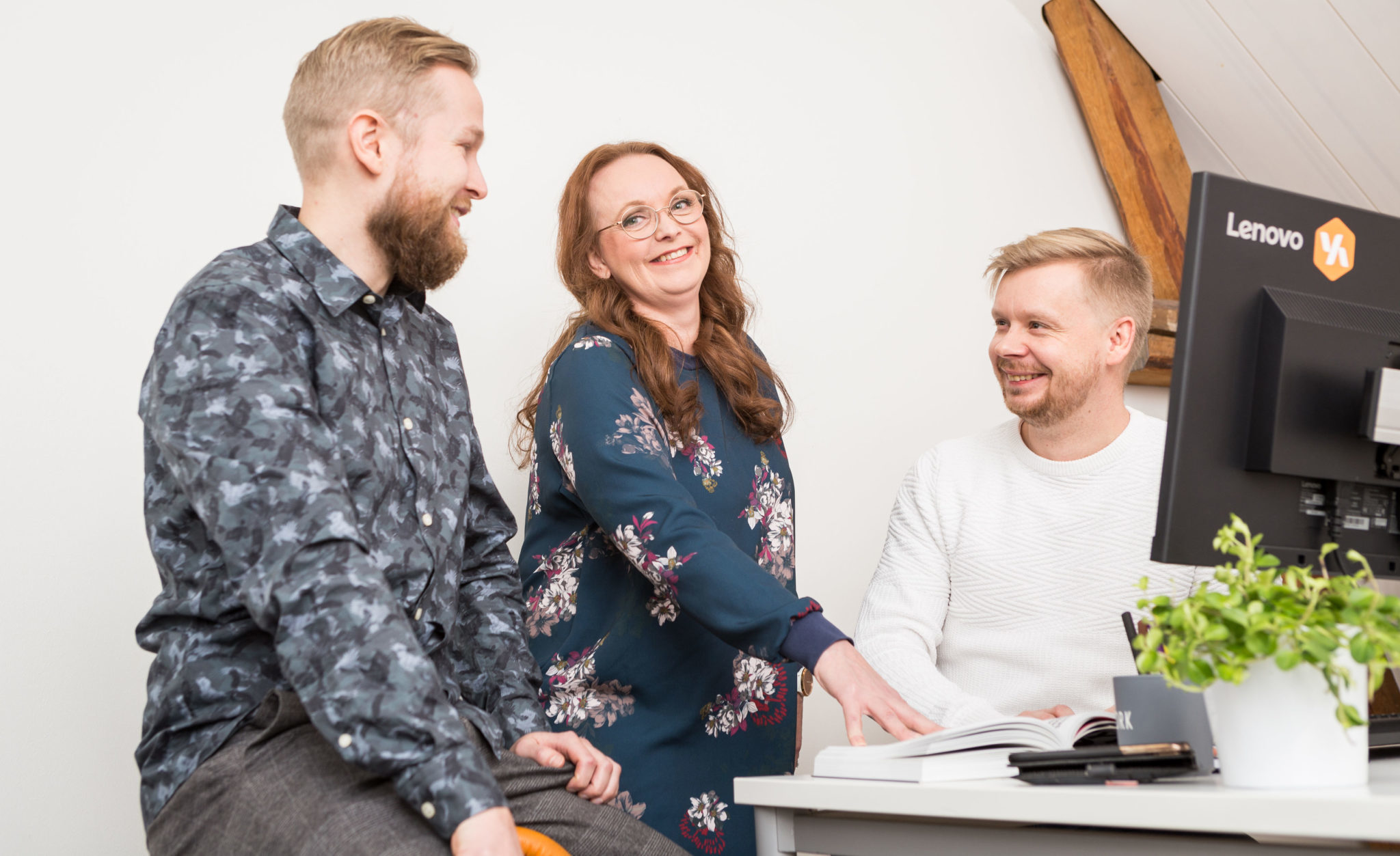 Change management coaching, in the image from the left: quality manager Tuomas Timonen, operational manager Outi Arontie and superior of the software team Joni Norring